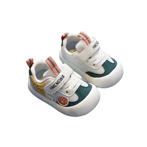 Breathable white toddler walking shoes with soft non-slip sole and velcro straps