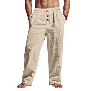 Vista dettagliata dei pantaloni casual in lino da uomo con coulisse e bottoni