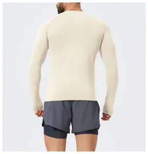 Back view of men's seamless slim-fit long-sleeve athletic t-shirt for fitness.