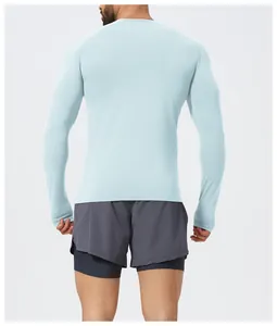 Detail view showing the back of a light blue men's slim fit seamless sports shirt