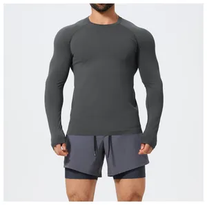 Men's seamless slim fit long sleeve gym top in charcoal grey for athletic performance