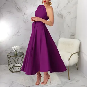 Elegant purple one-shoulder sleeveless midi dress with belted waist in chic room.