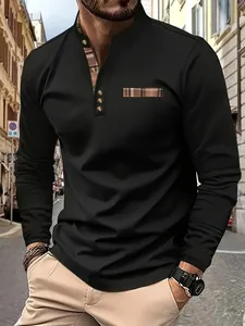 Detailed view of black long-sleeve Polo shirt with plaid accents and stand-up collar