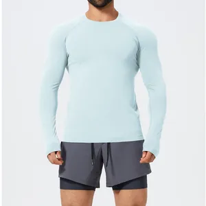 Premium men's slim-fit seamless long-sleeve sports T-shirt in light blue for gym