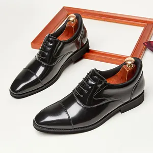 Men's glossy black patent leather cap-toe Oxford dress shoes for formal business occasions