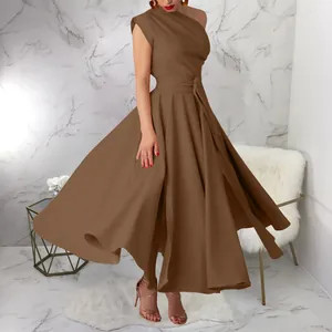 Full-length view of an elegant one-shoulder brown sleeveless maxi dress with waist belt