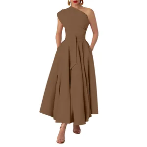 Detailed view of a brown one-shoulder sleeveless maxi dress with a cinched waist design