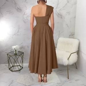 Full back view of a sleeveless brown one-shoulder waist-cinched solid color maxi dress