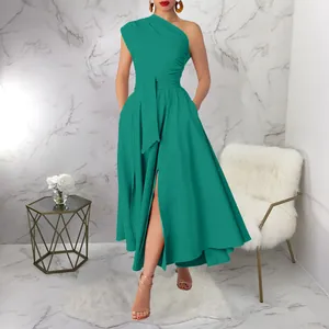 Elegant one-shoulder green sleeveless maxi dress with a belted waist and high slit detail