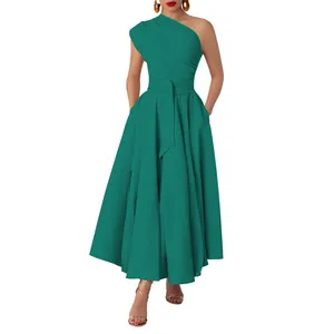 Detail view of teal one-shoulder maxi dress with cinched waist and elegant large swing skirt