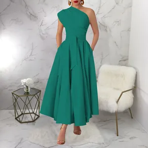 Detailed view of an elegant teal one-shoulder maxi dress with a cinched waist