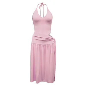 Detailed front view of a stylish pink halter neck top and side split midi skirt set