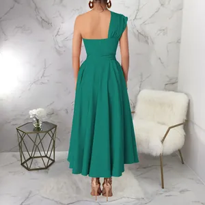 Back view of elegant one-shoulder teal maxi dress featuring a high waist and pleated skirt