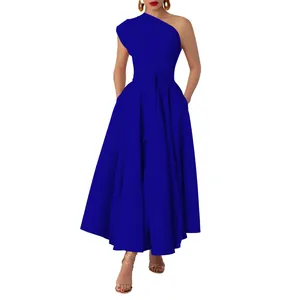 Front view detail of royal blue one-shoulder maxi dress with pleated waist and belt