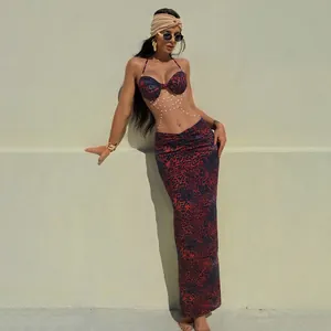 Sexy red and black animal print maxi dress with halter neck and delicate bead chain details