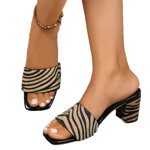 Stylish women's zebra print block heel sandals featuring a trendy square toe design