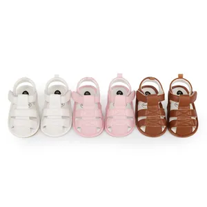 Detail view of multi-color baby summer sandals with soft non-slip soles in white, pink, brown