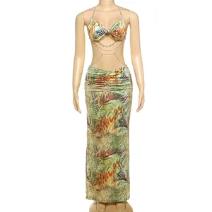 Detailed view of sexy tropical print halter dress with decorative waist bead chains