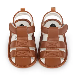 High-quality brown infant sandals featuring soft rubber soles and adjustable straps