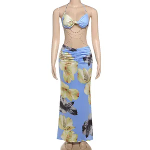 Sexy floral print two-piece set with halter top and long skirt featuring pearl chains