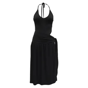 Full view of a minimalist black halter neck top and matching tie-waist midi skirt set