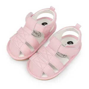 Close-up detail of breathable pink baby sandals featuring non-slip soft rubber soles