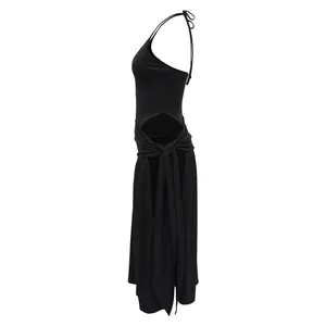 Side view of a sexy black halter top and tie-waist long slit skirt set for women
