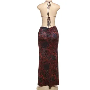 Detailed macro view of a sexy red and black leopard print backless halter maxi dress.