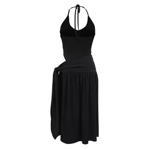 Detailed back view of a sexy solid black halter neck top and side slit wrap skirt set.