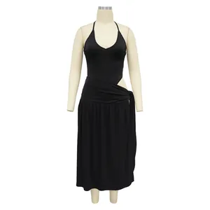 Close-up detail of sexy solid black halter top and side-tie slit midi skirt set