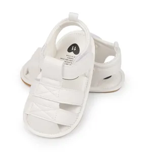Detailed view of white breathable infant sandals featuring soft anti-slip rubber sole