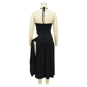 Back view of black halter neck top and high slit wrap midi skirt set for elegant women