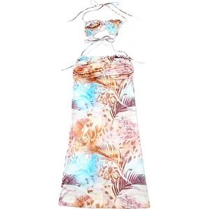 Full view of halter neck dress with tropical palm and leopard print on white background