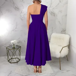 Rear view of an elegant deep purple one-shoulder flared maxi dress for formal events.