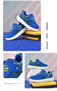 Detailed view of breathable mesh kids sports shoes with a yellow excavator design