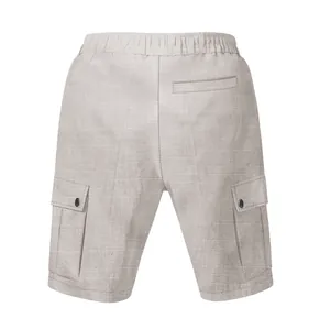 Detailed back view of men's slub linen cargo shorts featuring tactical pockets and texture