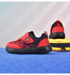 Detailed side view of breathable red and black children's sports walking shoes with mesh.