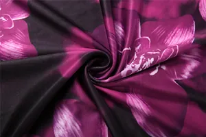 Detailed macro view of vibrant purple floral print fabric for sexy slim-fit dress