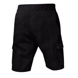 Rear view of men's black tactical cargo shorts in breathable slub linen fabric.