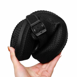 Flexible black EVA beach clogs shown bent to demonstrate softness and durability.