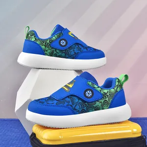 Breathable mesh children's sneakers with blue and green patterns and excavator velcro strap.