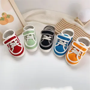 Multi-color children's canvas shoes with soft rubber soles and velcro straps for toddlers