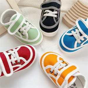 Vibrant children's canvas sneakers featuring easy hook-and-loop straps and comfortable soft soles.