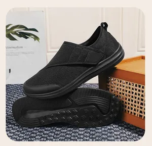 Detail view of black mesh walking shoes featuring breathable upper and non-slip rubber sole