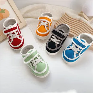 Colorful kids canvas sneakers with soft rubber soles and convenient velcro straps