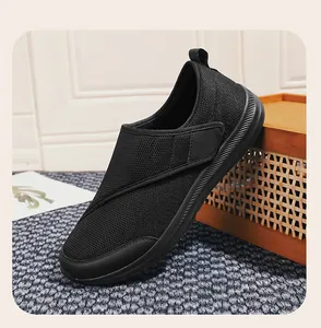 Side view of breathable black mesh walking shoes for seniors with a wide toe box design