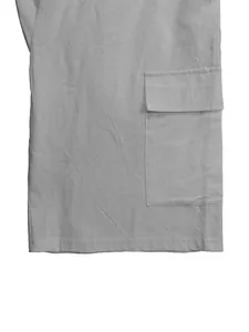 Detail view of the side flap pocket and textured linen fabric on men's cargo shorts