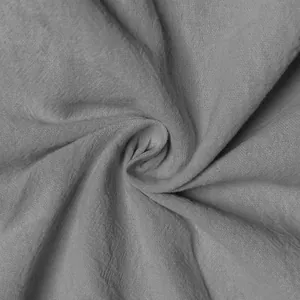 Detailed macro view showing the high-quality gray linen fabric texture and weave.