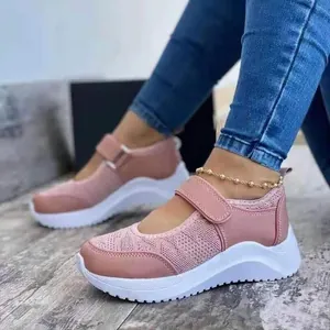 Stylish and comfortable pink mesh wedge sneakers for women with adjustable velcro strap design