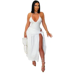 Sexy white two-piece set with a halter bodysuit and high slit wrap-around maxi skirt